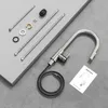 A kitchen faucet and its components are laid out on a gray surface, with a white instruction manual. Produktbild-Vorschau