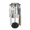 A round clothing rack with several garments hanging on it, displayed against a white background. Podgląd zdjęcia produktu