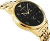 A close-up, angled shot of a gold Emporio Armani watch with a black face. Produktbild-Vorschau