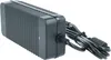 A black power adapter with a ribbed casing and a black cable is shown against a white background. Produktbild-Vorschau