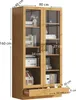 A wooden display cabinet with glass doors, filled with books and decorative items, with dimensions indicated by measurement lines and text. Podgląd zdjęcia produktu