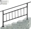 A black metal handrail for stairs is shown installed on marble steps, with installation hardware and tools displayed in the upper left corner. Anteprima dell’immagine prodotto