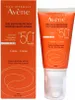 A product shot of an orange sunscreen tube and its box. Náhled obrázku produktu