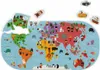 A world map puzzle with various animals and people depicted on different continents. Several toy vehicles are shown floating above the map. Produktbild-Vorschau
