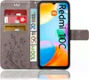 A flip case for a smartphone, showing the phone screen and the inside of the case with card slots and banknotes. Produktbild-Vorschau