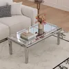 A living room scene with a couch and a mirrored coffee table. Anteprima dell’immagine prodotto
