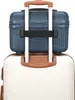 A close-up view of two stacked luggage pieces, a blue beauty case on top of a white suitcase. Anteprima dell’immagine prodotto