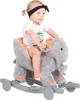 A baby is riding a plush elephant rocking toy. Voir les images du produit