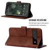 A product image showing a brown leather phone case with a phone inside, displayed in a stand-up position. Náhled obrázku produktu