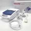 A Beurer medical inhalator and its accessories are displayed on a white surface, with the product's packaging in the background. Produktbild-Vorschau
