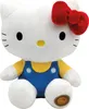 A plush toy of Hello Kitty wearing blue overalls and a yellow shirt, sitting against a white background. Anteprima dell’immagine prodotto