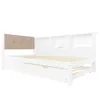A white daybed with a beige upholstered headboard and a built-in shelf unit. Náhled obrázku produktu