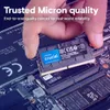 A hand is installing a RAM module into a laptop's motherboard. Náhľad obrázku produktu