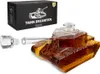 A tank-shaped decanter filled with amber liquid, shown with its stopper and packaging box. Podgląd zdjęcia produktu