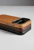 A stack of three phone cases in different colors, showing the side profile and camera cutout. Produktbild-Vorschau