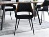 A dining room setting with chairs around a table. Náhled obrázku produktu