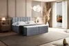 A bedroom scene featuring a bed, nightstands, and decor, with a large window showing an outdoor view. Produktbild-Vorschau