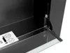 A close-up view of a black ethanol fireplace with a glass panel partially open, showing a metal component with safety symbols. Anteprima dell’immagine prodotto