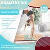 A woman performing a handstand on a yoga mat, with text overlays highlighting product features. Produktbild-Vorschau