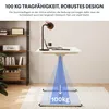 A standing desk with a laptop and lamp on it, with a graphic indicating its weight capacity. Anteprima dell’immagine prodotto