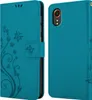 A teal flip case for a smartphone is shown, with one side open to reveal the phone and the other side showing the decorative front cover. Produktbild-Vorschau