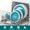 A set of blue and white ceramic plates and bowls are neatly arranged in a dishwasher rack. Produktbild-Vorschau