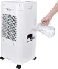 A person is pouring water into a white air cooler. Produktbild-Vorschau