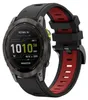 A close-up studio shot of a smartwatch with a black and red band. Náhled obrázku produktu