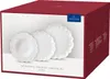 A product box displaying a set of white plates. Produktbild-Vorschau