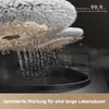 Close-up of a mop head with water flowing through it, demonstrating a cleaning feature. Text overlays highlight the product's effectiveness. Produktbild-Vorschau