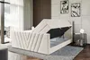 A bedroom scene featuring a bed with its storage compartment open, showcasing the mattress and frame. Produktbild-Vorschau