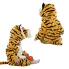 Two views of a baby wearing a tiger costume, one from the side and one from the back. Produktbild-Vorschau