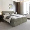 A modern bedroom with a large bed. Produktbild-Vorschau