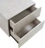 A close-up view of a light gray, two-drawer nightstand with a concrete texture. Anteprima dell’immagine prodotto