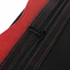 A close-up view of a black and red conference folder, showing a zipper and stitching. Voir les images du produit