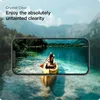A smartphone displaying a scenic view of a person kayaking on a clear lake, with mountains in the background. Podgląd zdjęcia produktu