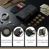 A collection of items including a wallet, cards, money, coins, earphones, and a key. Produktbild-Vorschau