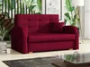 A red sofa bed is shown in a living room setting with a staircase and a floor lamp in the background. Náhled obrázku produktu