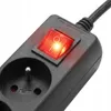 Close-up of a black power strip with a red illuminated switch and two electrical outlets. Podgląd zdjęcia produktu