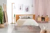 Wohnzimmerteppich ausgelegt im Schlafzimmer.  Produktbild-Vorschau