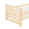 Close-up of the headboard of a wooden bed frame. Náhled obrázku produktu