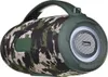 A camouflage-patterned portable speaker with a green handle and accents. Náhľad obrázku produktu