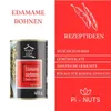 A can of edamame soybeans is shown next to a red panel with recipe ideas and a brand logo. Produktbild-Vorschau