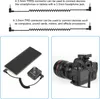 The image shows two separate scenarios: a smartphone connected to a small black device via a coiled cable, and a DSLR camera with a microphone attached via a coiled cable. Náhled obrázku produktu