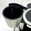 A close-up view of the coffee filter basket of a WMF Lumero coffee machine. Voir les images du produit