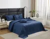 A bedroom scene with a neatly made bed. Produktbild-Vorschau
