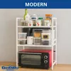 A white three-tier kitchen shelf with various containers and an oven on the bottom shelf. Anteprima dell’immagine prodotto