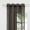 A close-up view of a brown sheer curtain hanging from a curtain rod. Produktbild-Vorschau