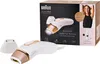 A Braun Silk-expert Pro 5 IPL hair removal system with its packaging. The product is white and gold, and it's shown with an attachment and a box. The box features an image of a woman and product information. Produktbild-Vorschau
