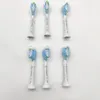 Six toothbrush heads are arranged in two rows of three on a white background. Anteprima dell’immagine prodotto